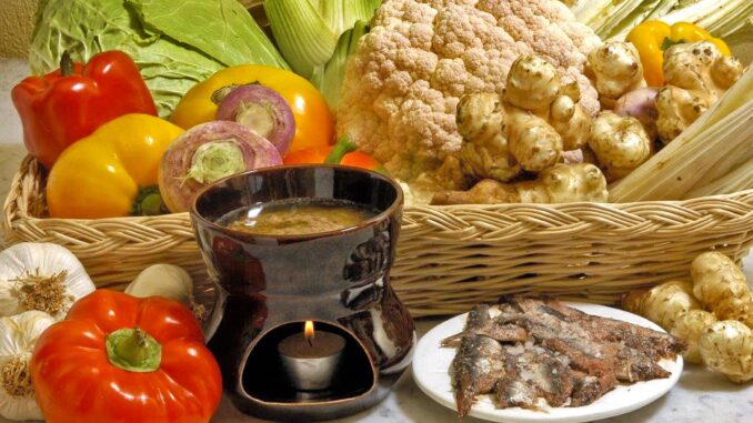 Il Bagna cauda day accende i fujòt in 150 locali di tutto il mondo